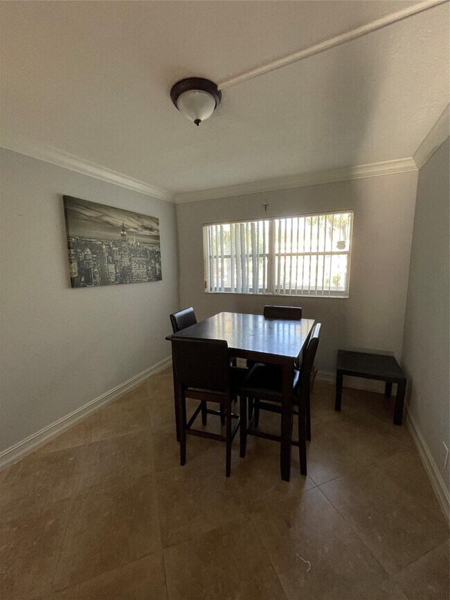 Building Photo - 6075 N Sabal Palm Blvd