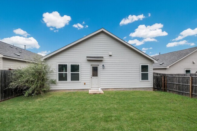 Building Photo - Open-Concept Living with New Flooring