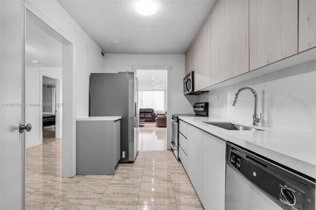 Building Photo - 5401 Collins Ave