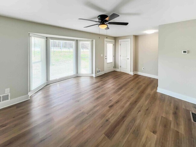 Building Photo - Completely Renovated 3 BR/3 BA Ranch with ...