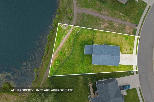 Building Photo - Stocked Pond, Walking Trails and More!!