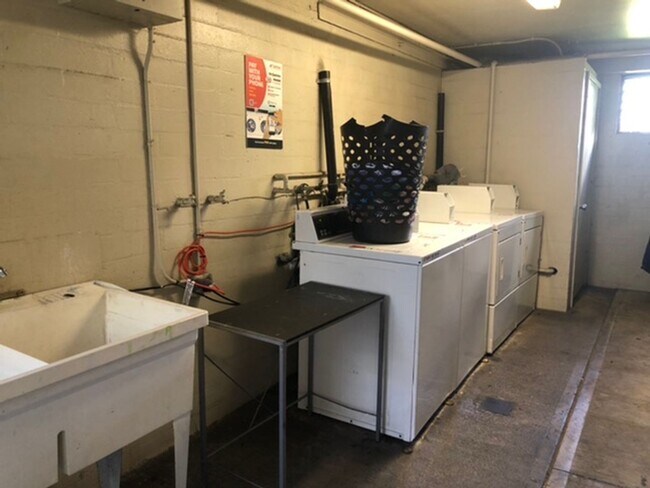 Building Photo - Central Location with Free Utilities!