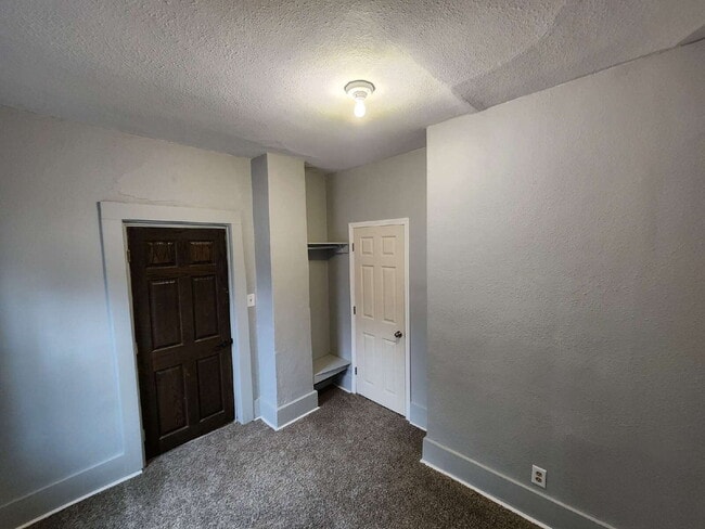 Building Photo - One Bedroom LOWER Duplex