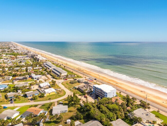 Building Photo - Luxury Oceanfront Living – Fully Furnished...