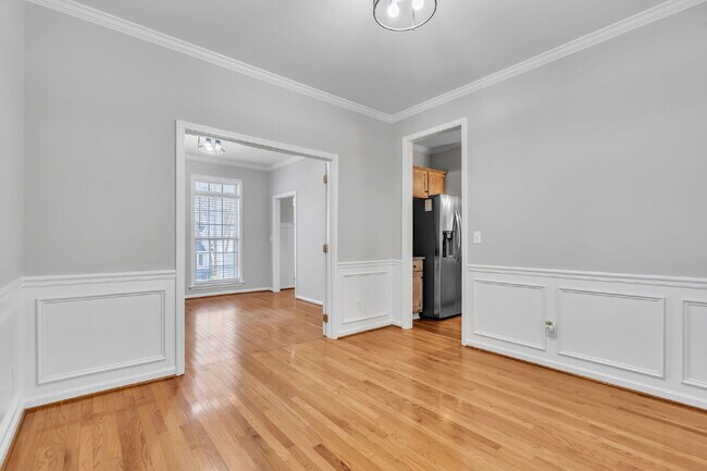 Building Photo - Beautifully Appointed 4BR Home Featuring a Screened Porch, Spacious Living Areas & Community Pool...