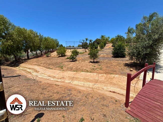Building Photo - Beautifully upgraded LARGE home with a pool and basketball court in Mockingbird Canyon!
