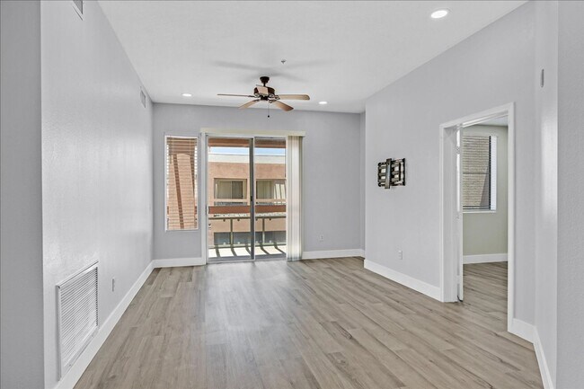 Building Photo - Top level 2 bedroom condo located in guard...