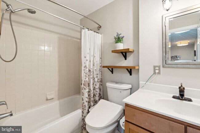 Building Photo - Welcome to this beautifully updated three ...