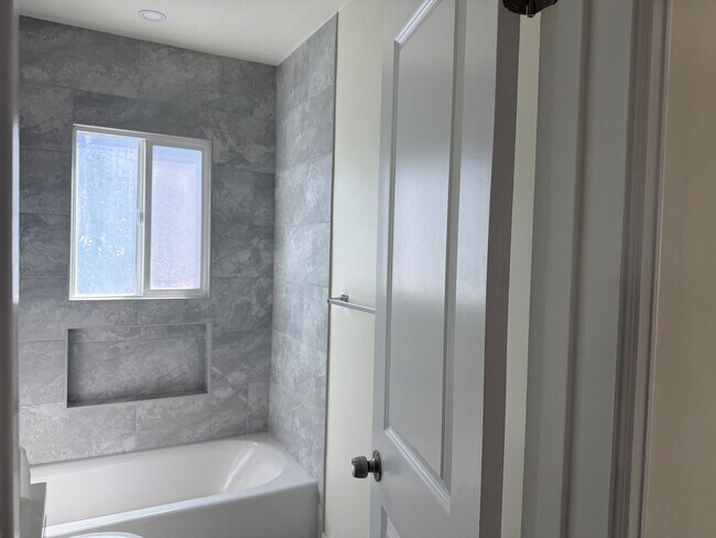 Building Photo - FOR RENT — COMPLETELY REMODELED Apartment