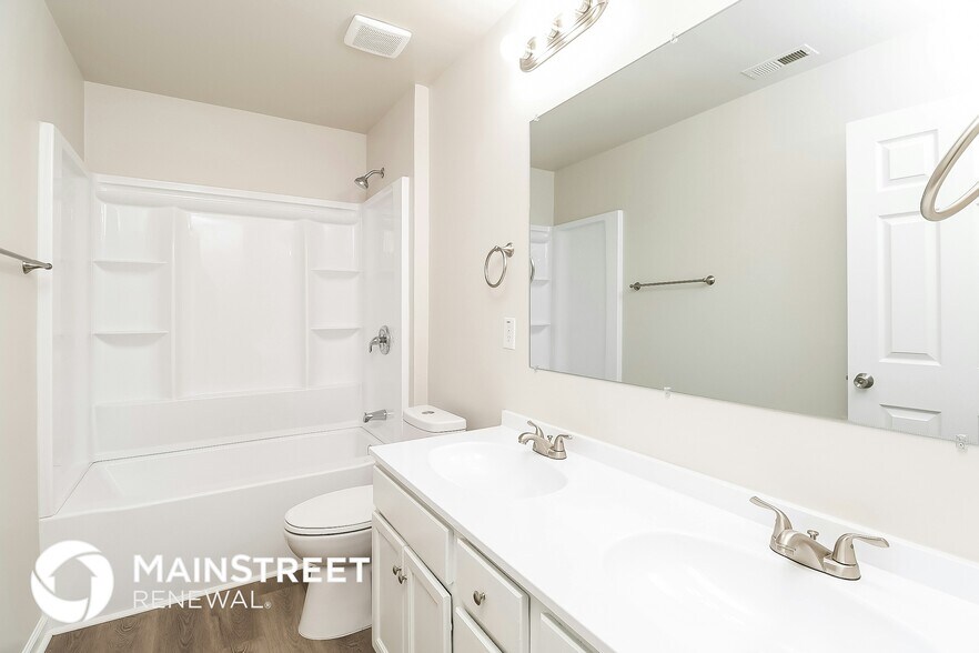 Building Photo - 6673 Thistle Down Dr