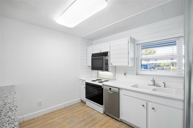 Building Photo - 9950 47th Ave N