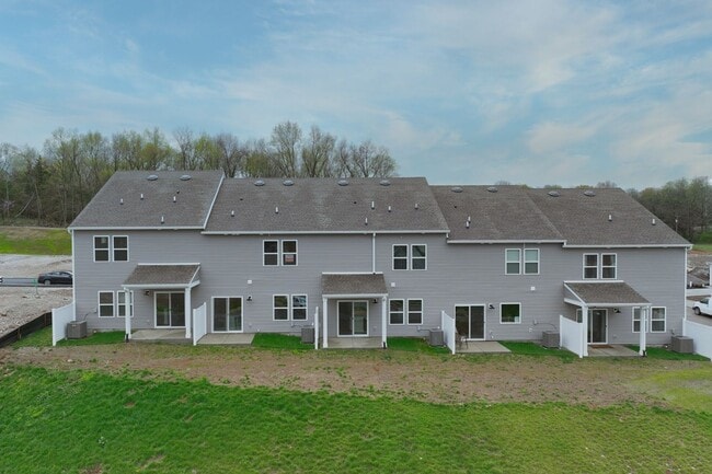 Building Photo - **BE THE LUCKY ONE TO LIVE IN THIS 2024-BUILT TOWNHOME**