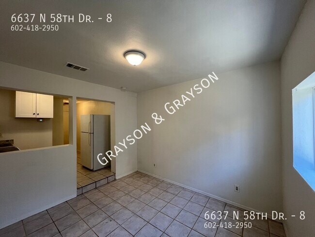 Building Photo - 6637 N 58th Dr