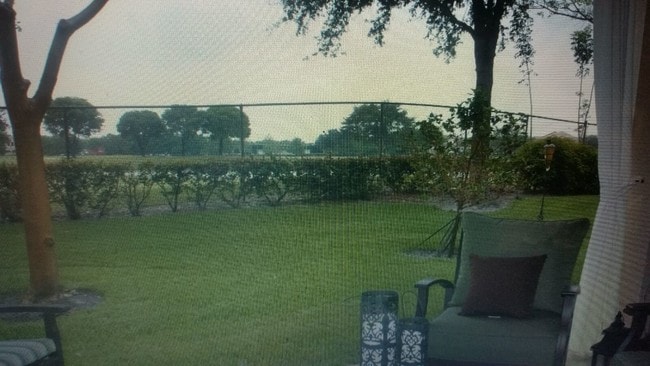back patio and view of golf course - 3240 Fairway Cir