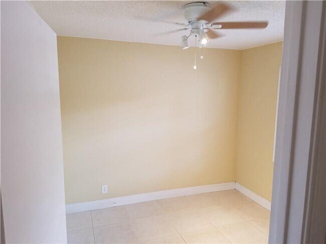 Building Photo - 8750 Royal Palm Blvd