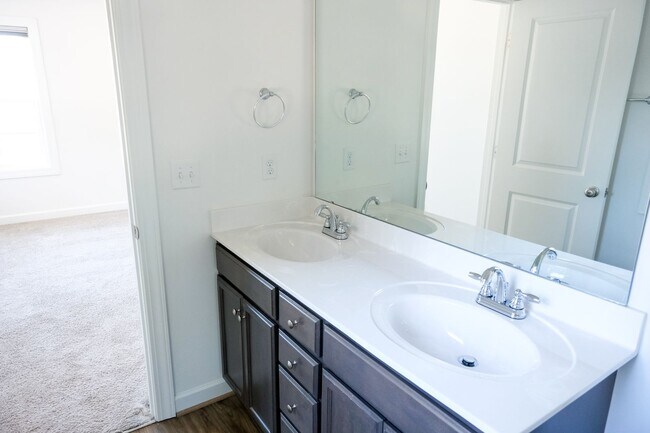 Building Photo - Like-new 3 bedroom, 2.5 bath house with an organic pond!