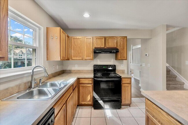 Building Photo - Bright, Spacious, and Ideally Located in t...