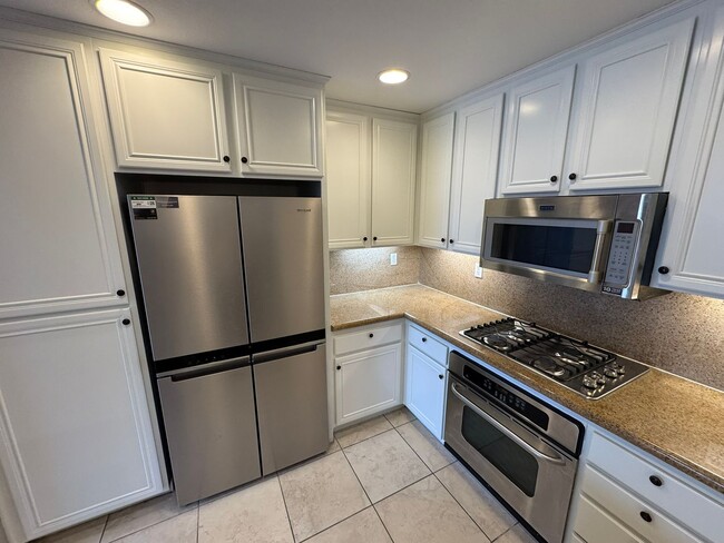 Building Photo - Sleek 3-Bed + Flex Corner Condo with Attached Tandem Garage