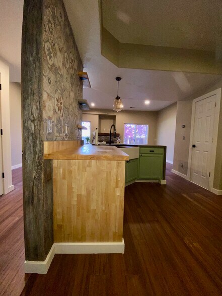 Butcher block countertop at entrance to kitchen - 9056 Gale Blvd