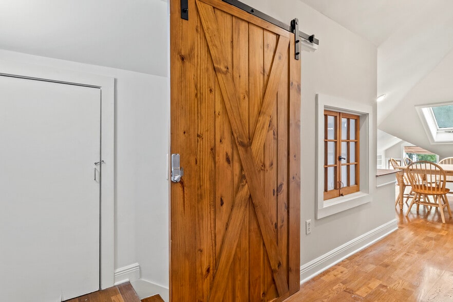 Lockable door separates downstairs from upstairs within apartment - 305 E 14th Ave