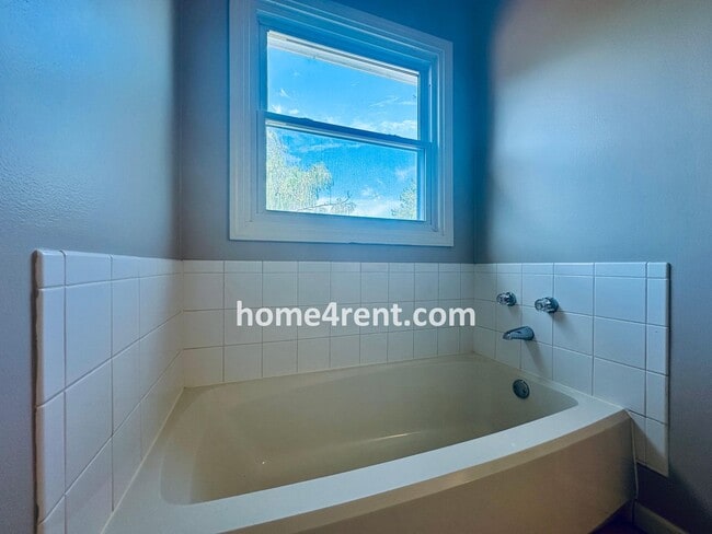 Building Photo - Brand New Paint, Wood Floors, Walkout Fini...
