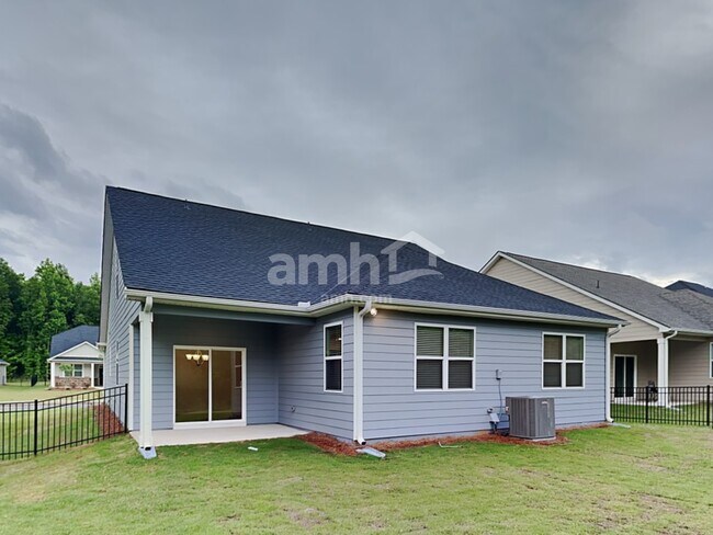 Building Photo - 7058 Creeksong Dr