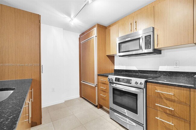 Building Photo - 10275 Collins Ave