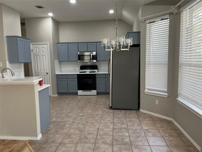 Building Photo - 10306 Snapdragon Dr