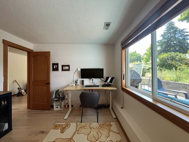 Building Photo - Bright and Open 4 Bedroom Cedar Mill Home with Vaulted Ceilings, Skylights & Multiple Living Areas