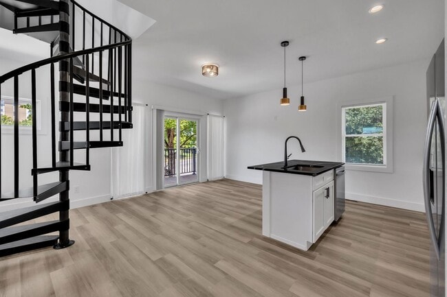 Building Photo - Modern New Construction Townhome with Roof...