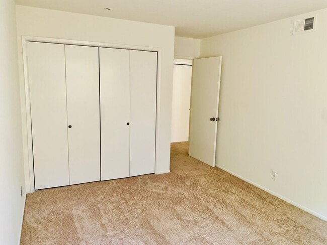 Building Photo - Unbeatable Location! Ocean View two bedrooms and two bathrooms two story condo with gated undergr...