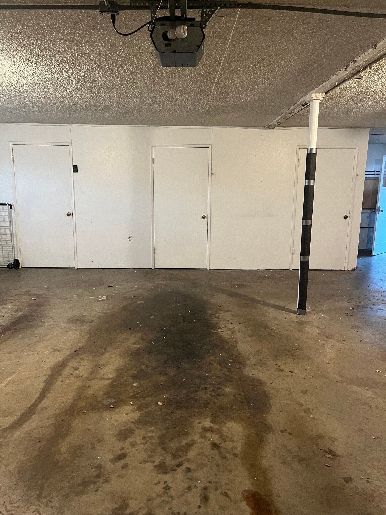 Parking spot in secured garage. 2 Openers. 8 x 8 locked storage area in front of parking spot - 513 28th St