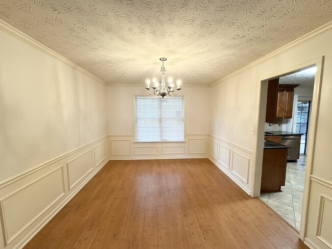 Building Photo - Rare Sugar Hill Rental with Huge Fenced Yard and Outdoor Living Space