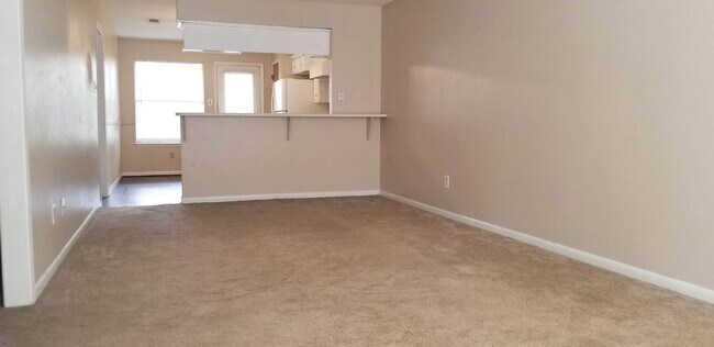 Building Photo - The right side unit of this duplex offers a comfortable and functional layout ideal for small fam...