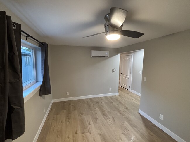 Remote controlled heating and cooling systems (mini-split) in the living room and bedroom. - 1504 W 7th Pl