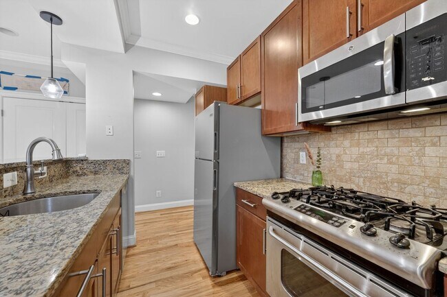 Building Photo - Available Now! Six Minute Walk to Metro, Gorgeous Community!