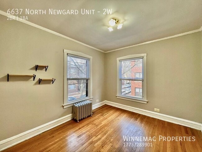 Building Photo - 6637 N Newgard Ave