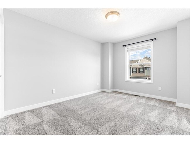 Building Photo - Spacious 3BR Townhome with Loft & Attached 2-Car Garage - Available NOW!