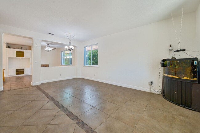 Building Photo - Spacious 4-Bedroom Home, Beautifully Maint...