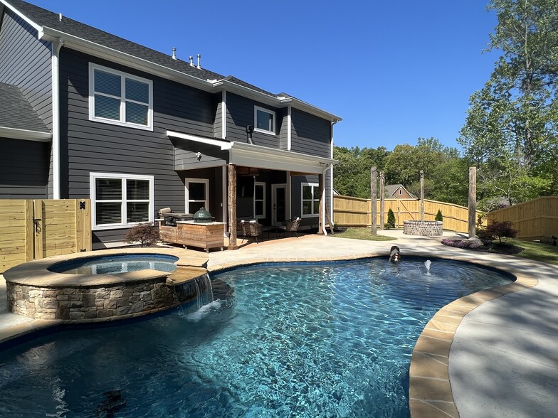 Backyard oasis complete with pool, hot tub, and fire pit - 1608 Alcovy Ridge Xing
