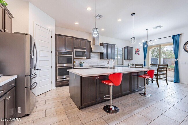 Building Photo - Charming 5-bed, 4.5-bath, 3 Car home with ...