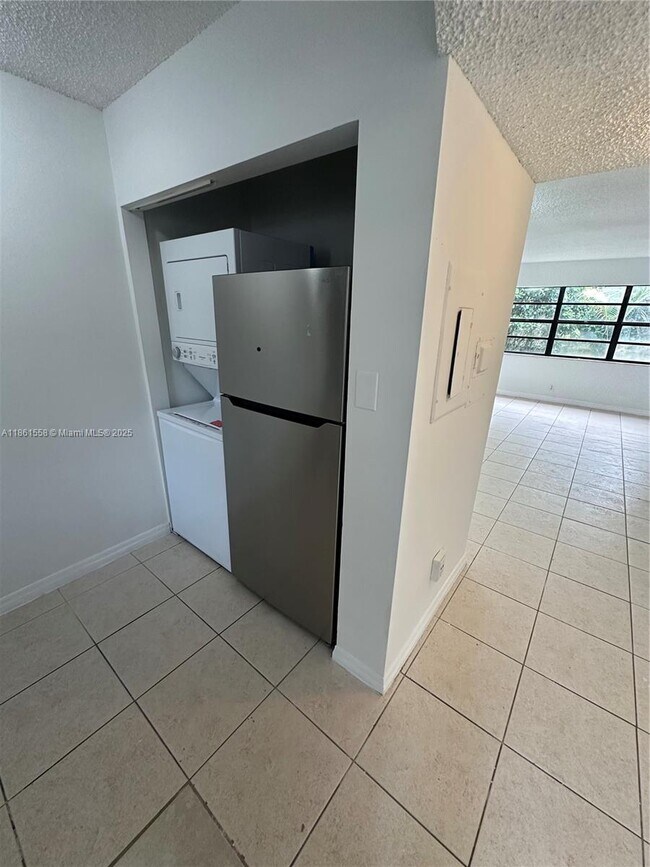 Building Photo - 11213 Royal Palm Blvd