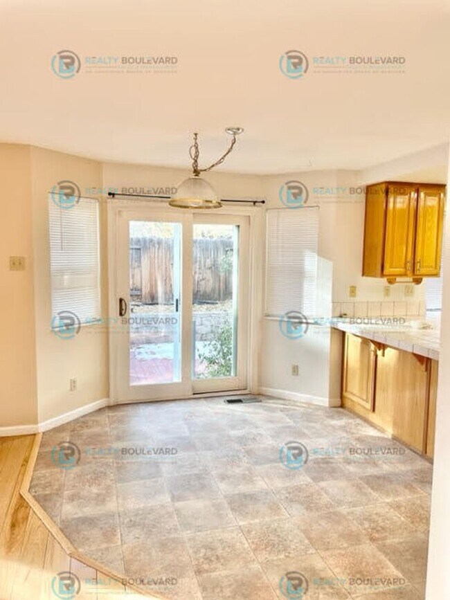 Building Photo - Well-Appointed 4BR Home with Open Floorplan & Expansive Yard