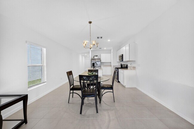 Building Photo - 5876 NW Sweetwood Dr