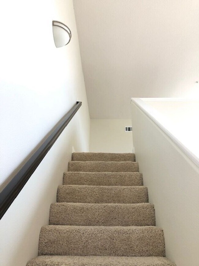 Building Photo - PICTURE PERFECT 2 BR/2 BATH PLUS LOFT END UNIT CONDO WITH DIRECT ACCESS 2 CAR GARAGE