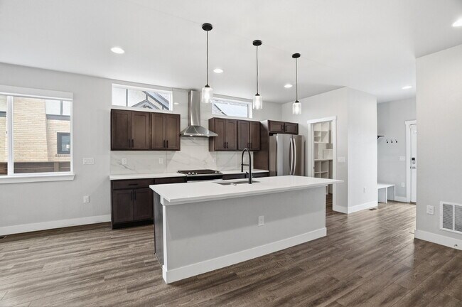 Building Photo - $3,940.95 - 3 Bed, 2.5 Bath Townhome In Denver with Central AC and Outdoor Space!