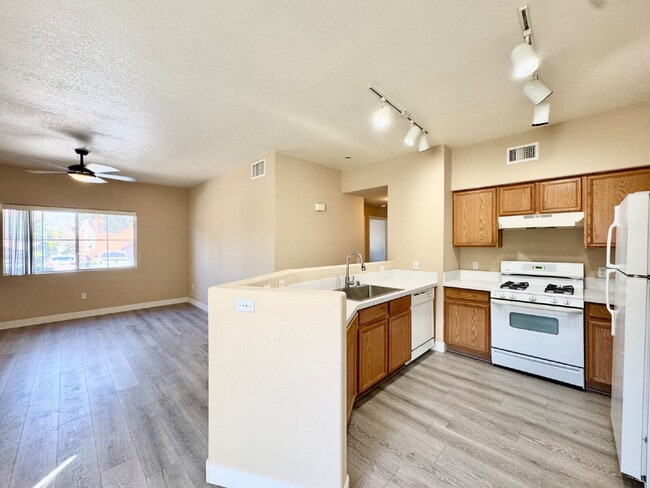 Building Photo - DOWNSTAIRS CONDO | GATED COMMUNITY | CENTENNIAL HILLS | UPDATED 3 BEDROOM
