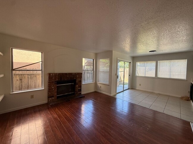 Building Photo - 4 bed | 2.5 bath | 1712 SF | 2 Car Garage | Two Story | Tenant pays $175 monthly for WS&G