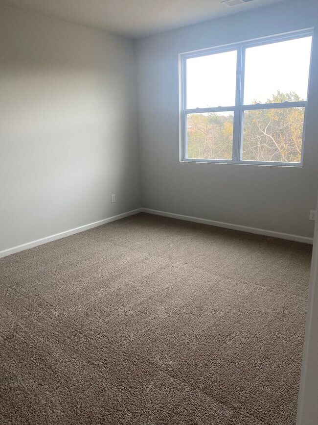 Building Photo - New Construction - 4 bedroom 2 full baths