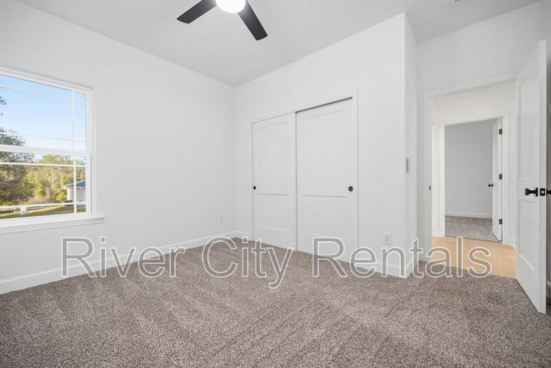 Building Photo - 7596 Silver Sands Rd